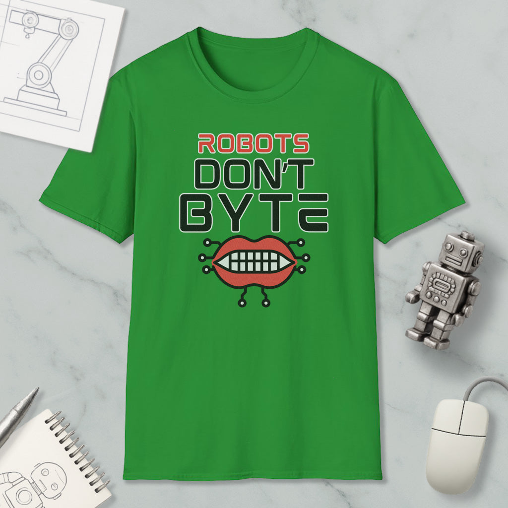 a green t-shirt with a graphic design, a computer mouse, a notebook, and a small robot figurine.