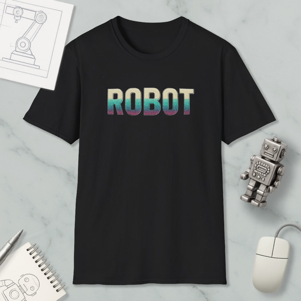 a black t-shirt with the word "ROBOT" printed on it, along with a small robot figurine and a computer mouse.