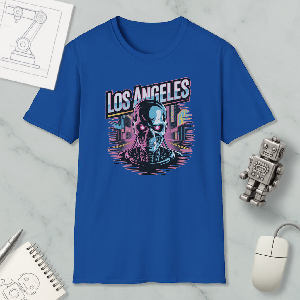 a blue t-shirt with a graphic design of a skull and cityscape, along with various objects such as a computer mouse, a notebook, and a robot.