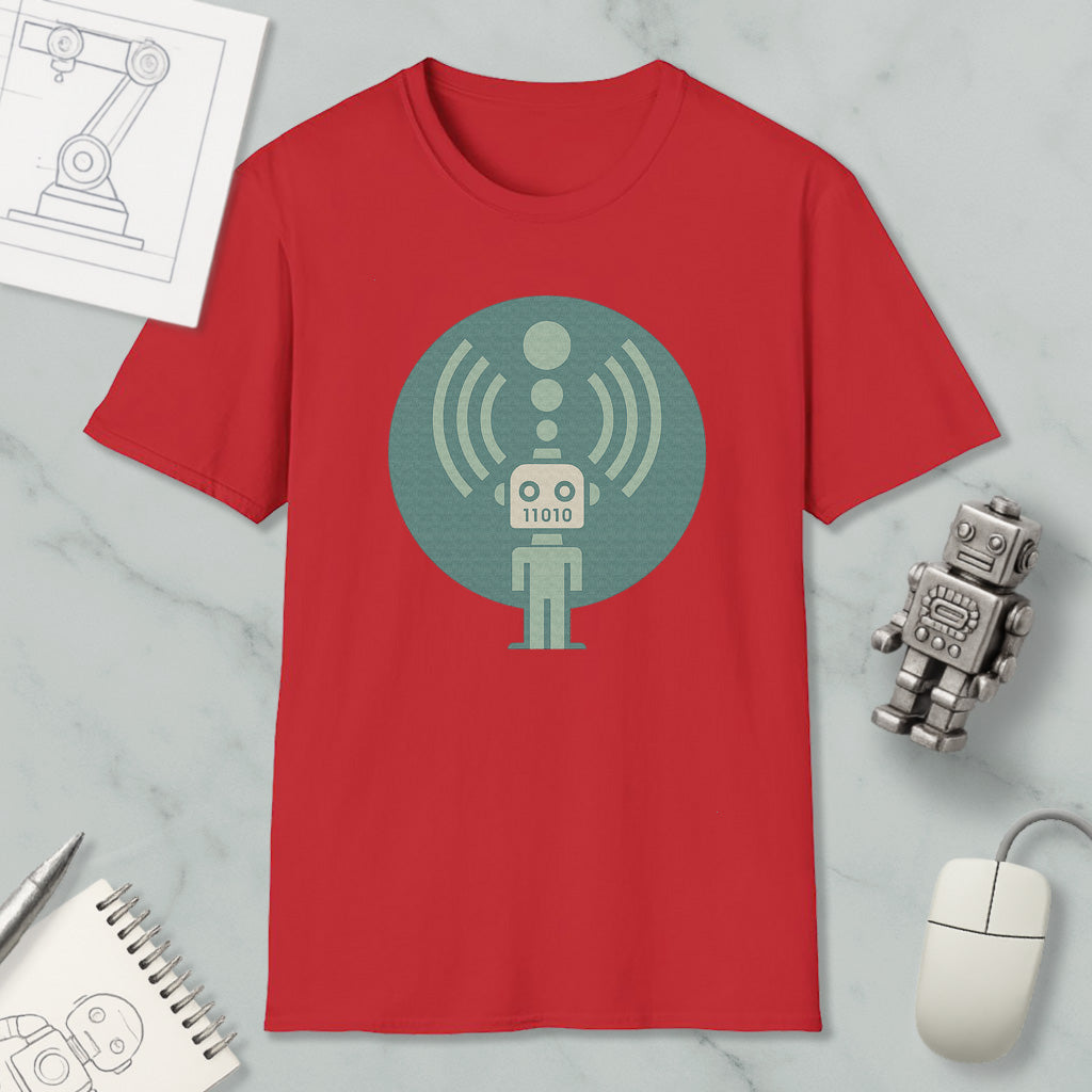 a red t-shirt with a graphic design of a robot, along with various objects such as a mouse, a notebook, and a pen.