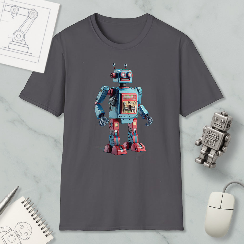 a gray t-shirt with a colorful robot design printed on it, along with a computer mouse and a notebook.
