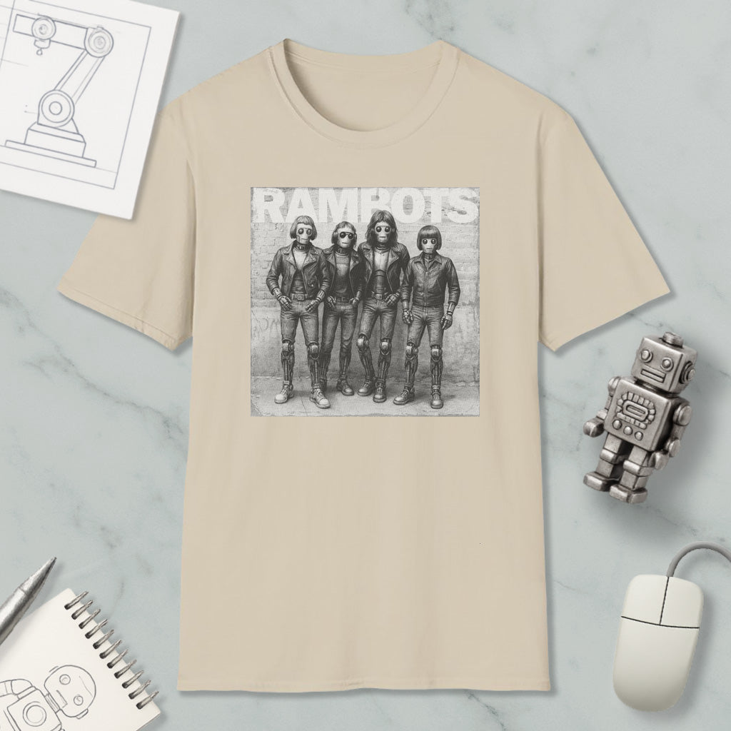 a beige t-shirt with a black and white graphic of four people, along with a computer mouse and a notebook.