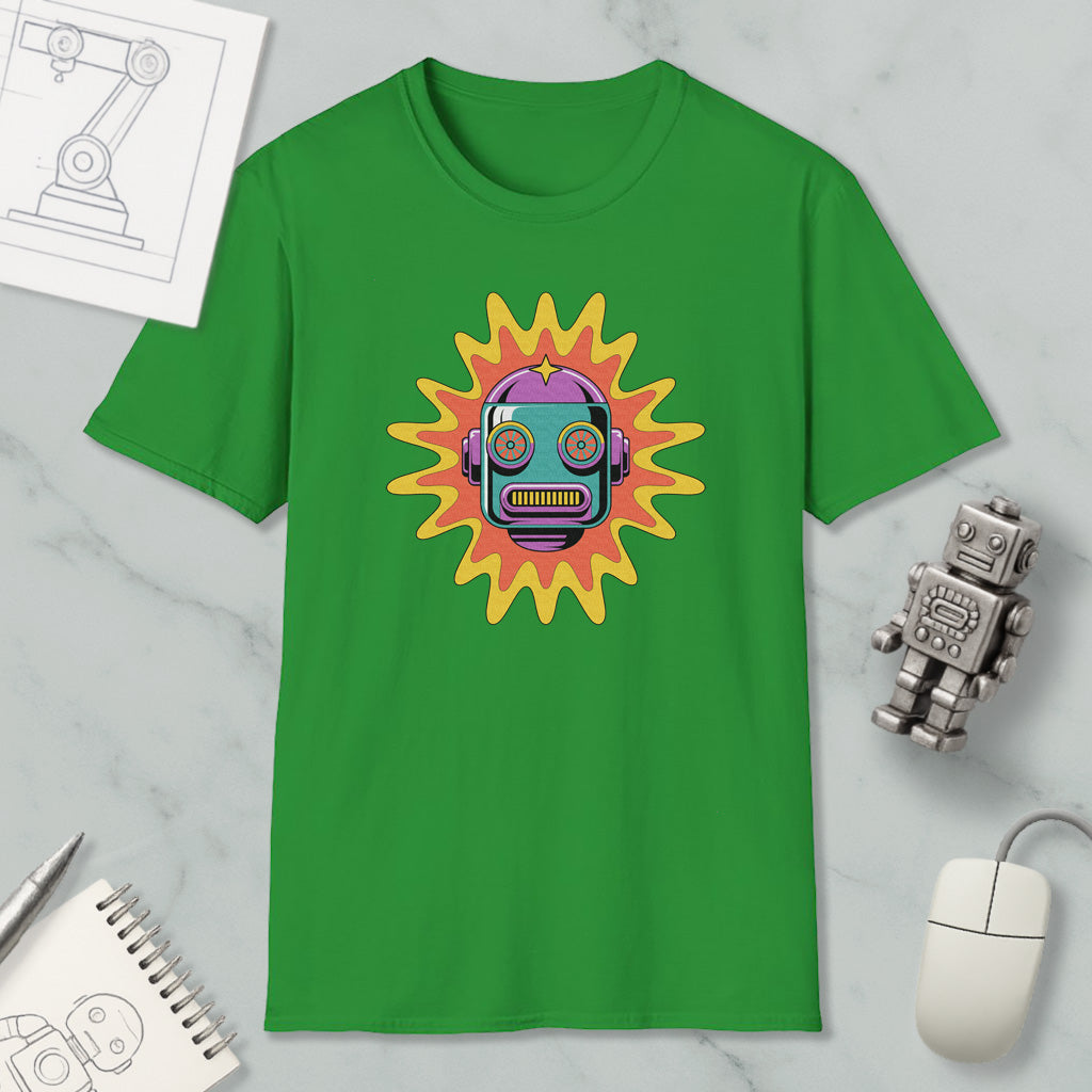 a green t-shirt with a colorful robot design, along with various objects such as a computer mouse, a notebook, and a sketch of a robot.
