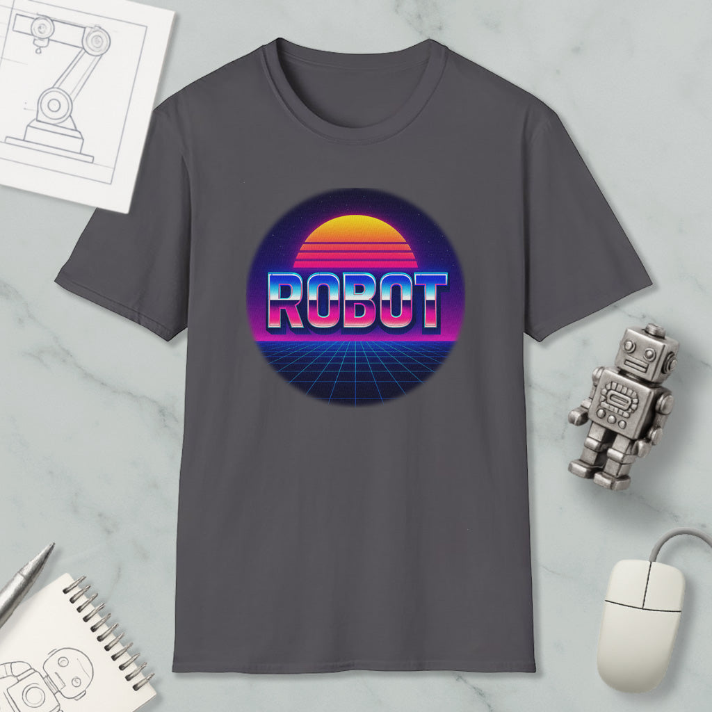 a gray t-shirt with a graphic design of a robot and a sunset, along with a computer mouse and a notebook.