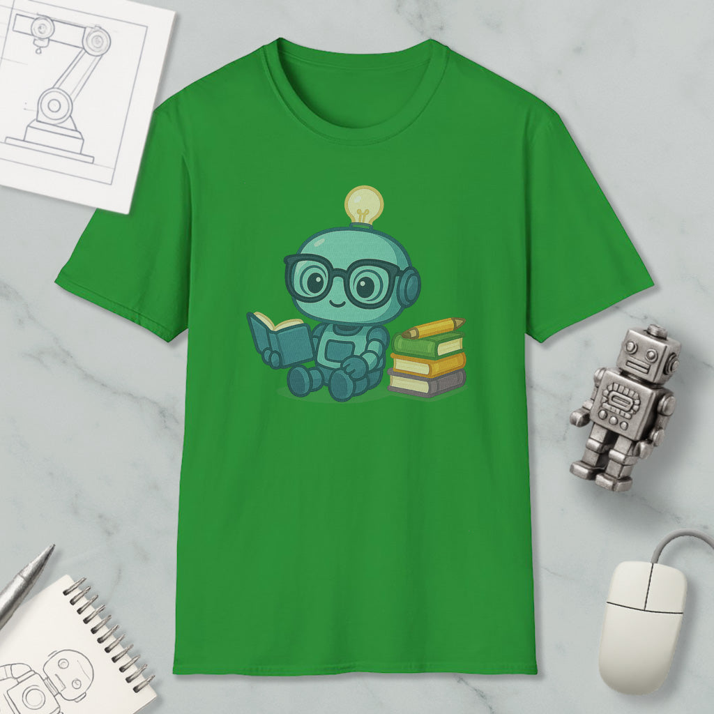 a green t-shirt with a cartoon robot sitting and reading a book, surrounded by various objects such as a computer mouse, a notebook, and a stack of books.