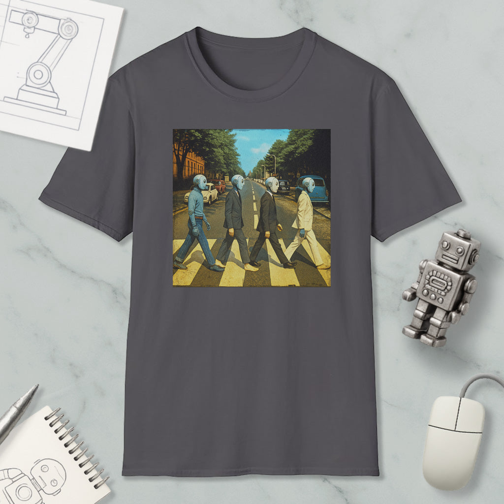 a gray t-shirt with a graphic design depicting four people walking on a crosswalk, with a robot figure and other objects in the background.