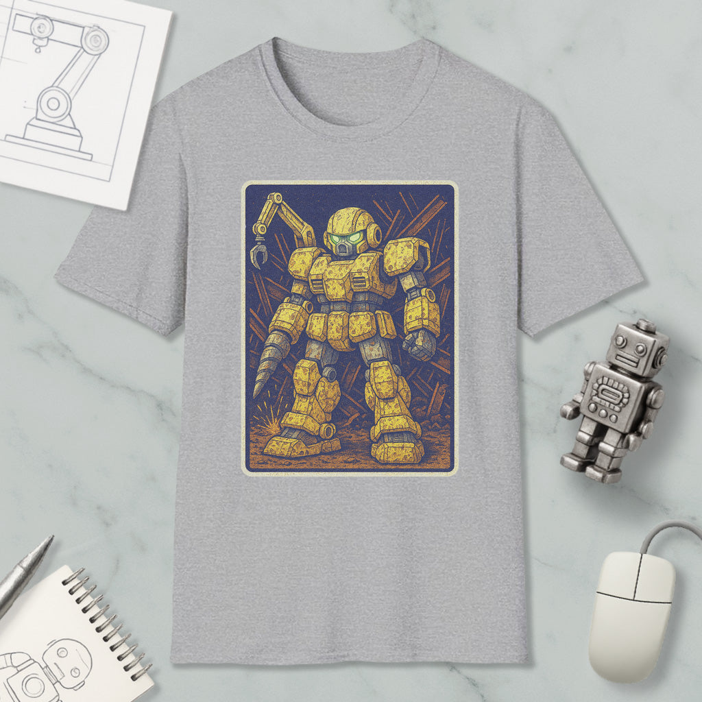 a gray t-shirt with a graphic of a yellow robot or robot-like figure, along with various objects such as a computer mouse, a pen, and a notebook.