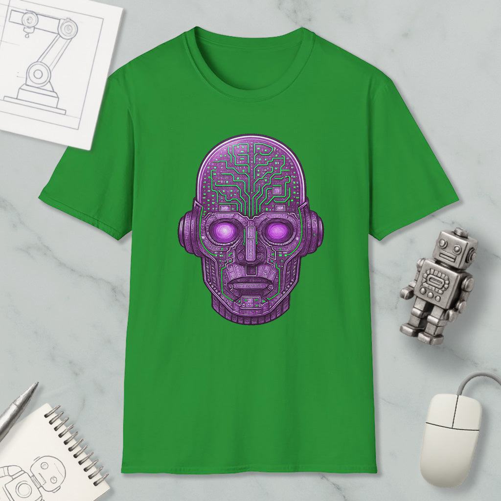 a green t-shirt with a purple robot or robot-like face design on it, along with various objects such as a computer mouse, a notebook, and a pen.