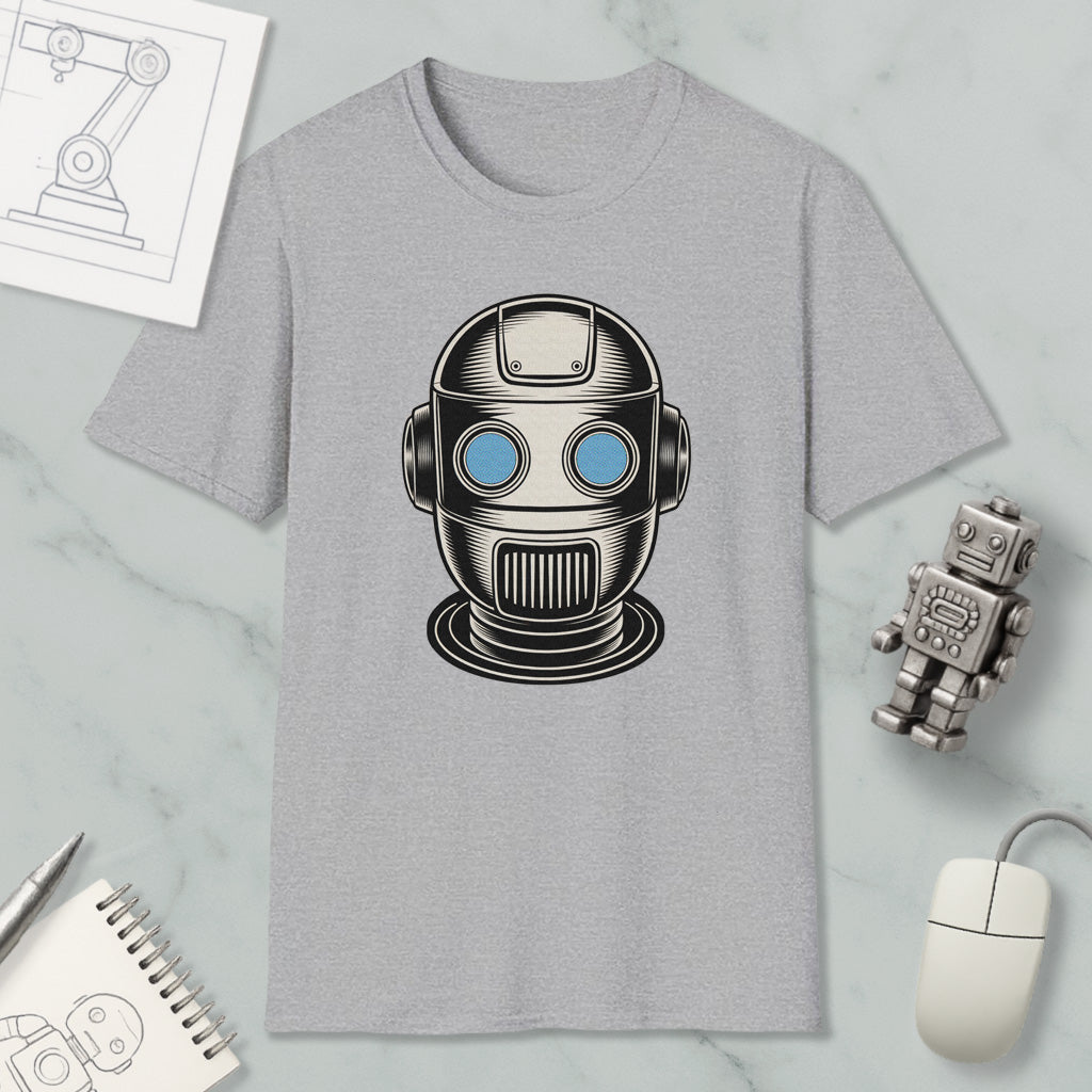 a gray t-shirt with a graphic of a robot head, along with various objects such as a computer mouse, a notebook, and a pen.