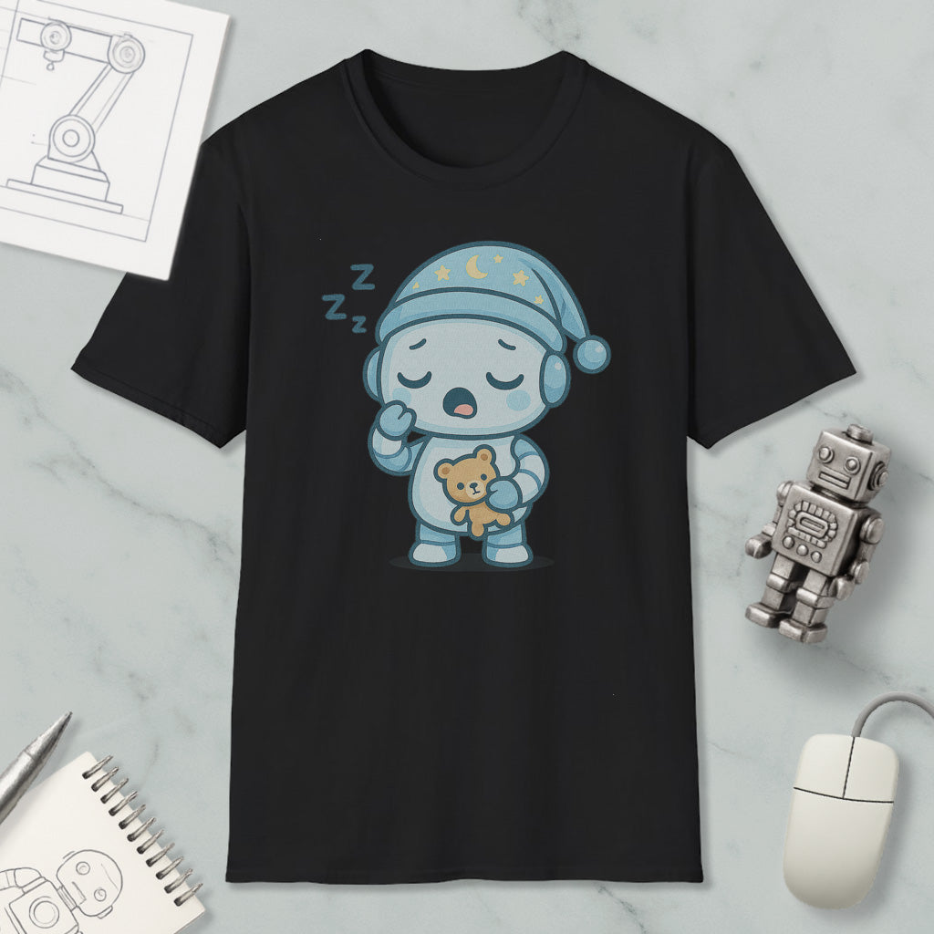 A black t-shirt with a cartoon image of a robot wearing a blue hat and holding a teddy bear, along with a mouse and a notebook.