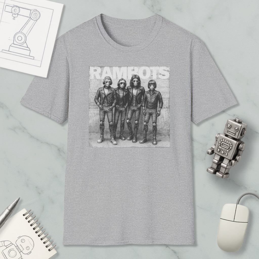 a gray t-shirt with a black and white graphic of four people, along with a computer mouse and a notebook.