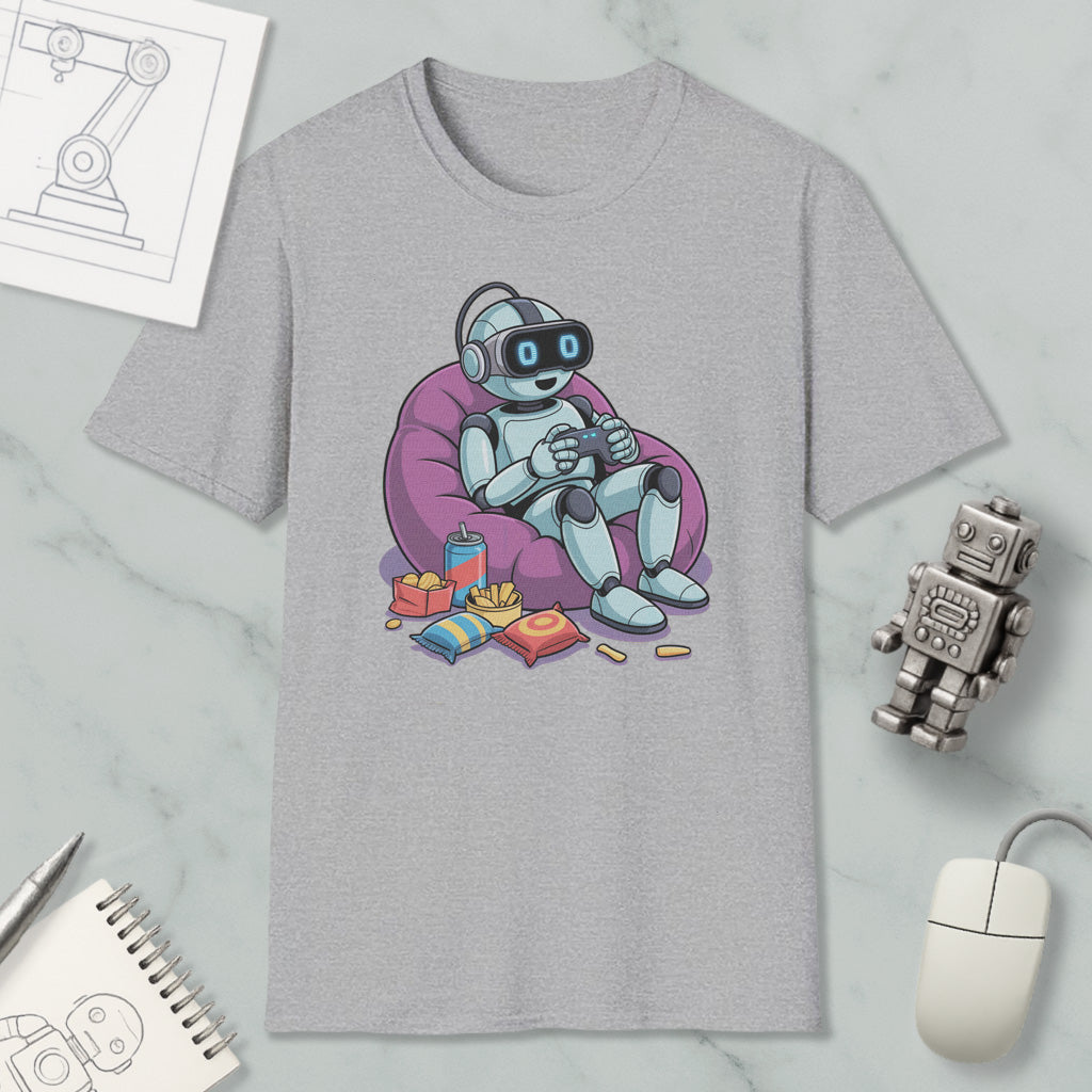 a gray t-shirt with a cartoon robot sitting in a bean bag chair, holding a remote control and surrounded by snacks.