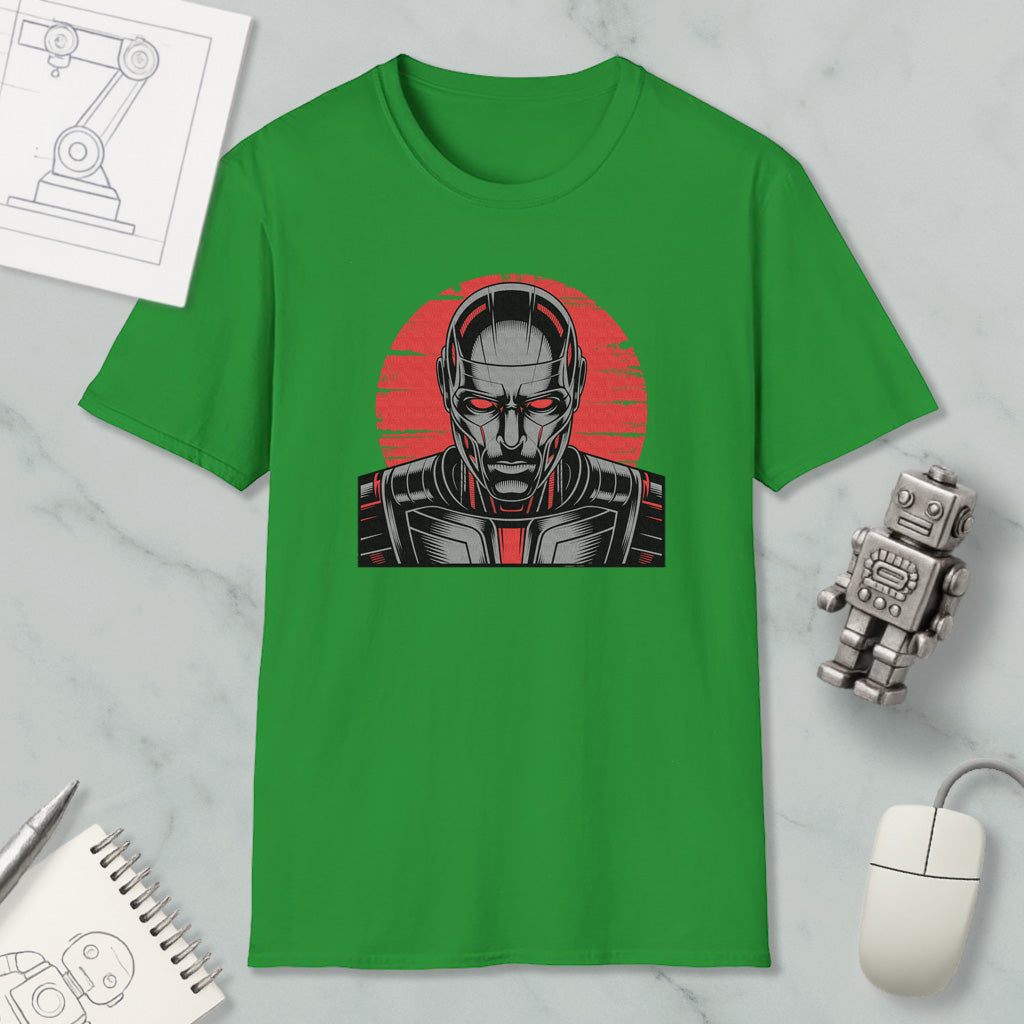 a green t-shirt with a graphic design of a robot or cyborg-like figure, along with a computer mouse and other office supplies.