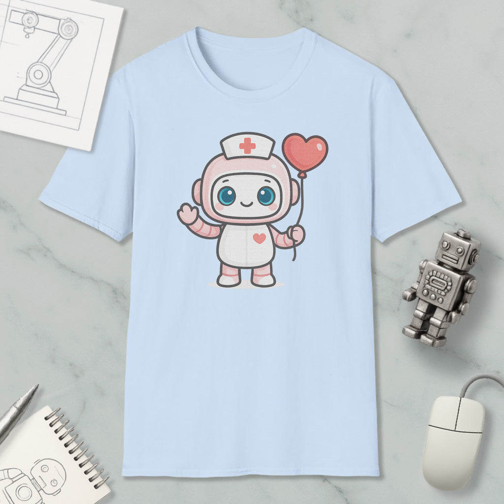 A light blue t-shirt with a cartoon nurse character holding a heart-shaped balloon, along with a computer mouse, a notebook, and a robot figurine.