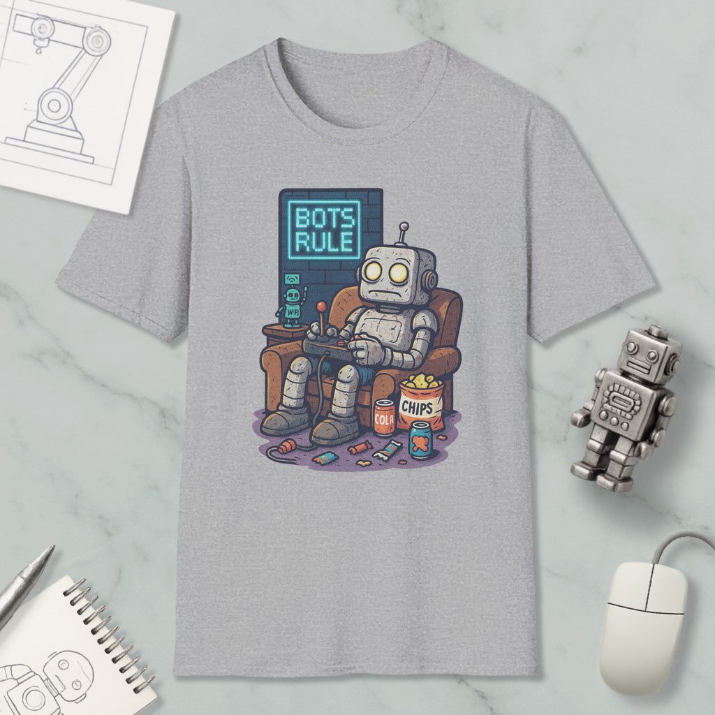 a gray t-shirt with a cartoon robot sitting in a chair and playing a video game, surrounded by various objects such as a computer mouse, a keyboard, and a notepad.