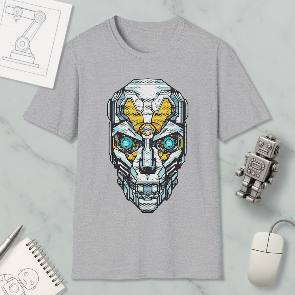 a gray t-shirt with a graphic design of a robot or cyborg head, surrounded by various objects such as a computer mouse, a notebook, and a pen.