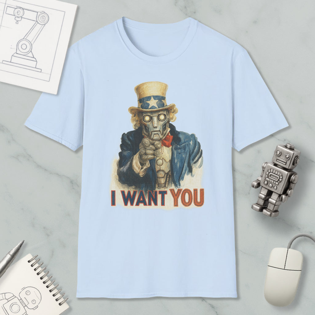 a light blue t-shirt with a graphic of a robot character and the text "I WANT YOU" printed on it. The t-shirt is displayed on a marble surface, along with various objects such as a computer mouse, a pen, and a notebook.