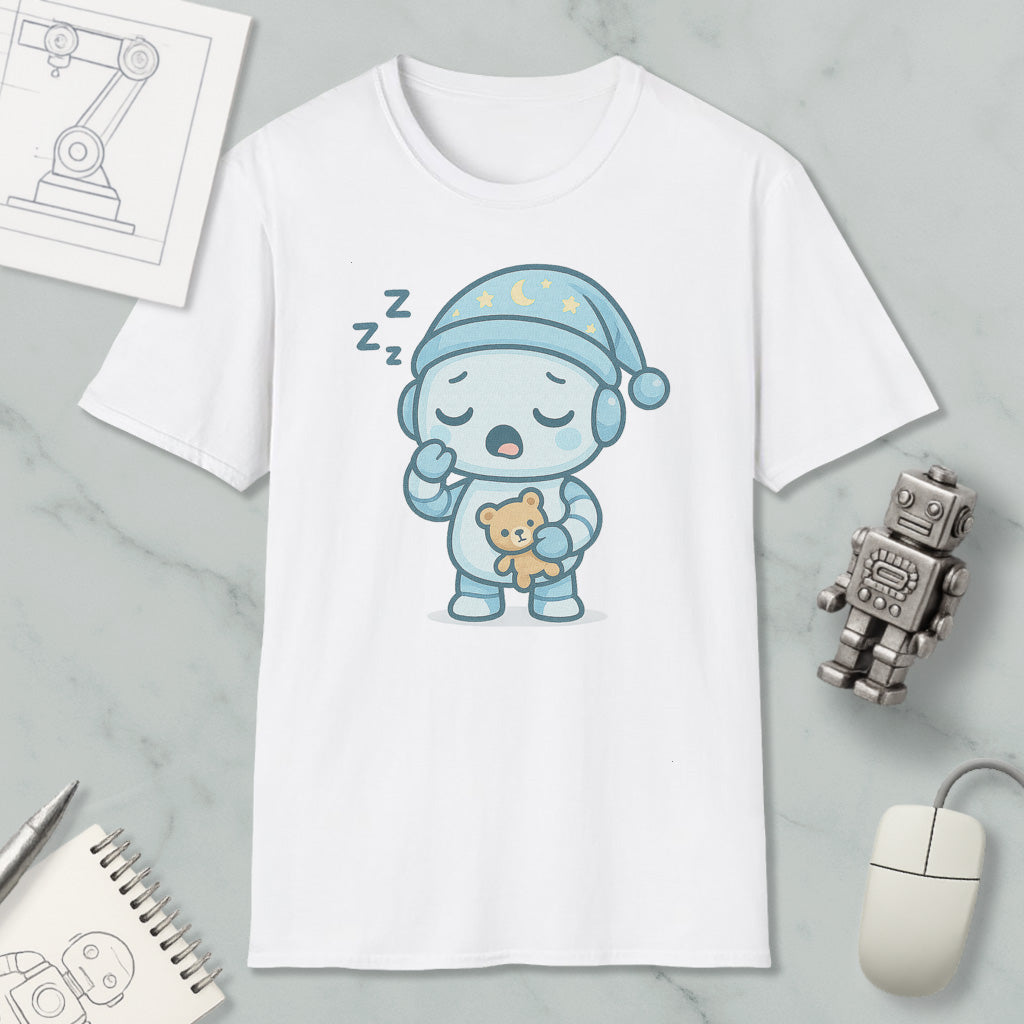 A white t-shirt with a cartoon robot wearing a blue hat and holding a teddy bear, along with a computer mouse and a notebook.
