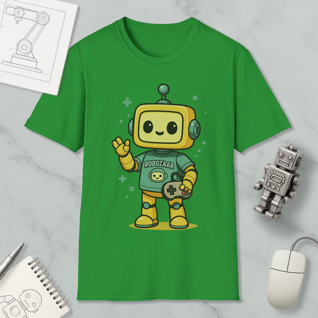 a green t-shirt with a cartoon robot character, a mouse, and a notebook on a marble surface.