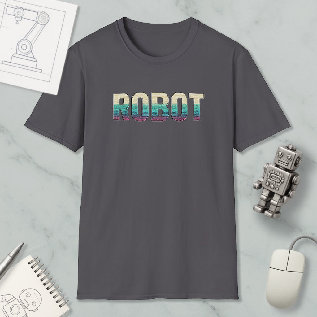 a gray t-shirt with the word "ROBOT" printed on it, along with various objects such as a computer mouse, a notebook, and a robot figurine.