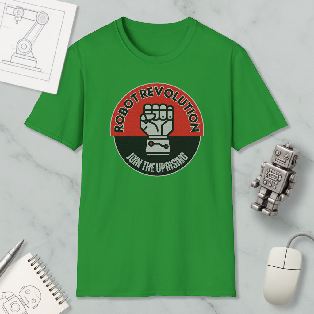 a green t-shirt with a graphic design, a computer mouse, a notebook, and a small robot figurine.