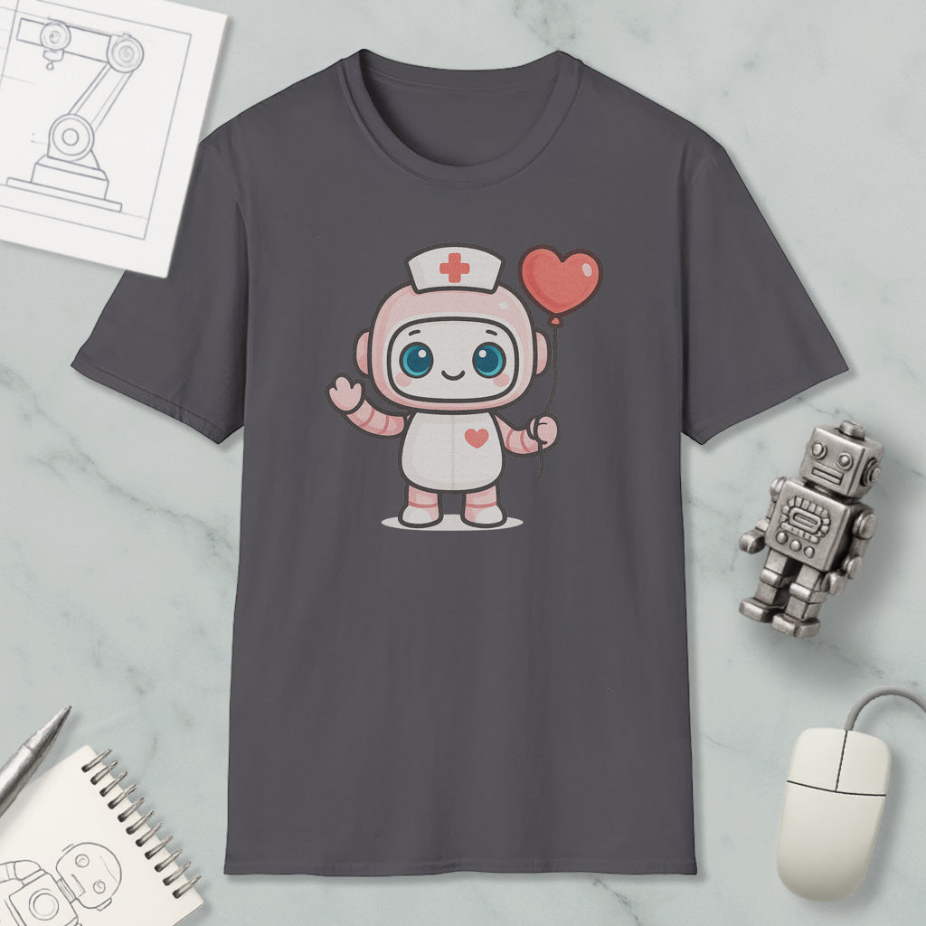 a gray t-shirt with a cartoon robot wearing a nurse's hat and holding a heart-shaped balloon. The t-shirt is displayed on a marble surface, along with a computer mouse, a notebook, and a small robot figurine.