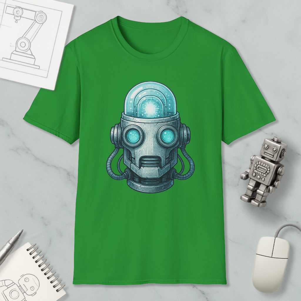 a green t-shirt with a graphic of a robot head, along with a computer mouse, a notebook, and a pen on a marble surface.