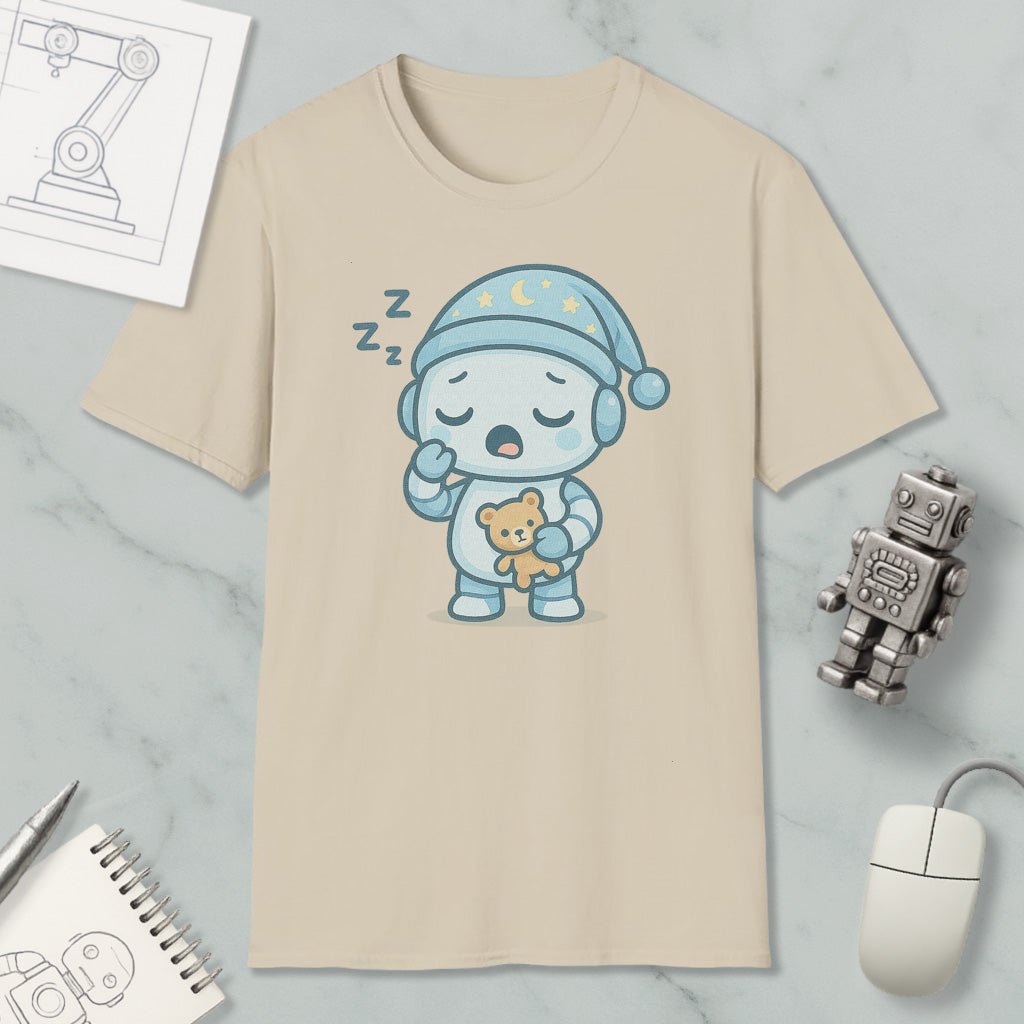 a t-shirt with a cartoon robot wearing a blue hat and holding a teddy bear, along with a computer mouse and a notebook.