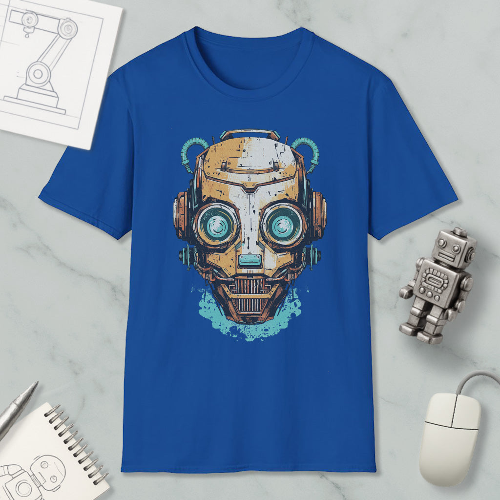 a blue t-shirt with a graphic design of a robot or cyborg head, along with various objects such as a computer mouse, a notebook, and a pen.