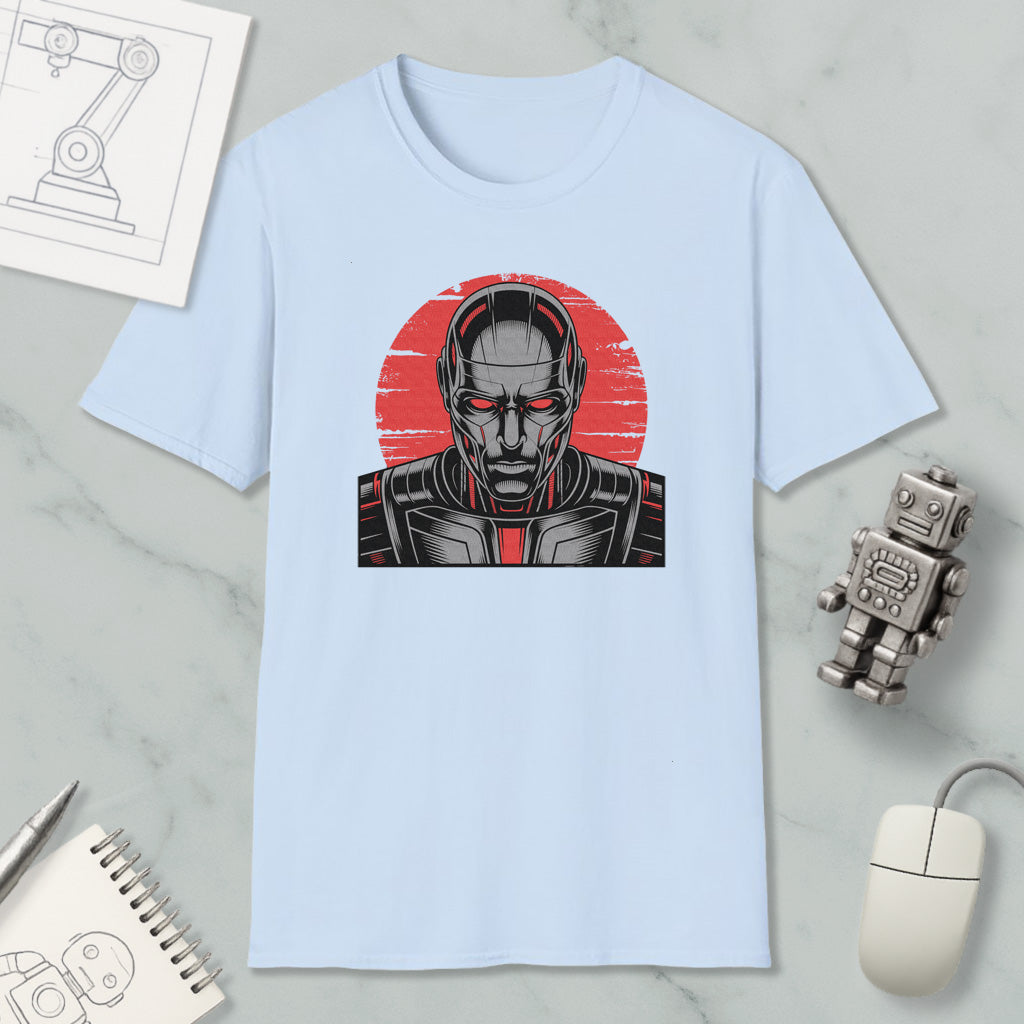 a light blue t-shirt with a graphic design depicting a robot or cyborg-like figure, along with various objects such as a computer mouse, a notebook, and a pen.