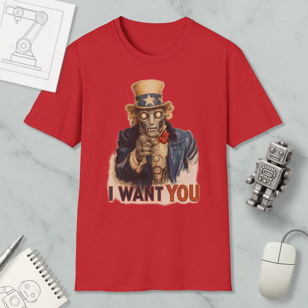 a red t-shirt with a graphic of a character wearing a top hat and holding a gun, along with the text "I WANT YOU" printed on it. The t-shirt is displayed on a marble surface, and there are various objects such as a computer mouse, a pen, and a notebook nearby.