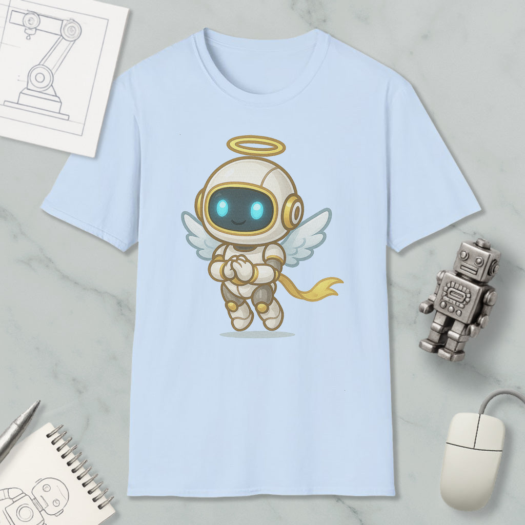 A light blue t-shirt with a cartoon illustration of a winged robot or angel-like character, along with various objects such as a computer mouse, a notebook, and a small robot figurine.
