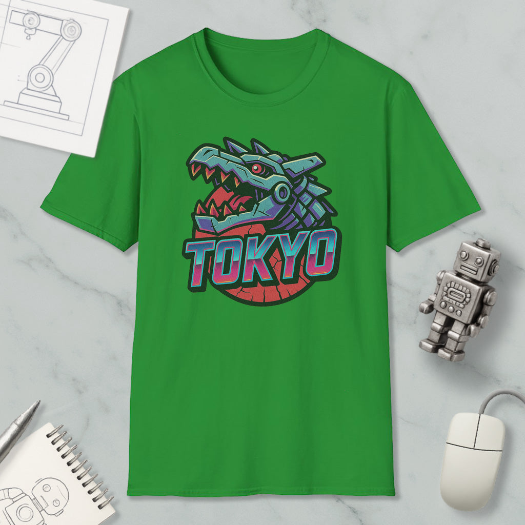 a green t-shirt with a graphic of a green dragon head and the word "TOKYO" written on it, along with some other items such as a mouse, a notebook, and a robot.