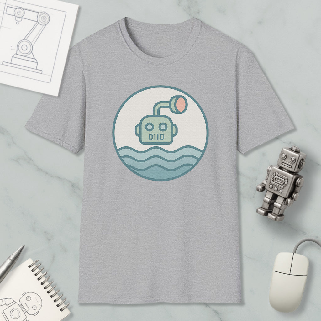 a gray t-shirt with a graphic of a robot or submarine in the water, along with various objects such as a computer mouse, a notebook, and a pen.