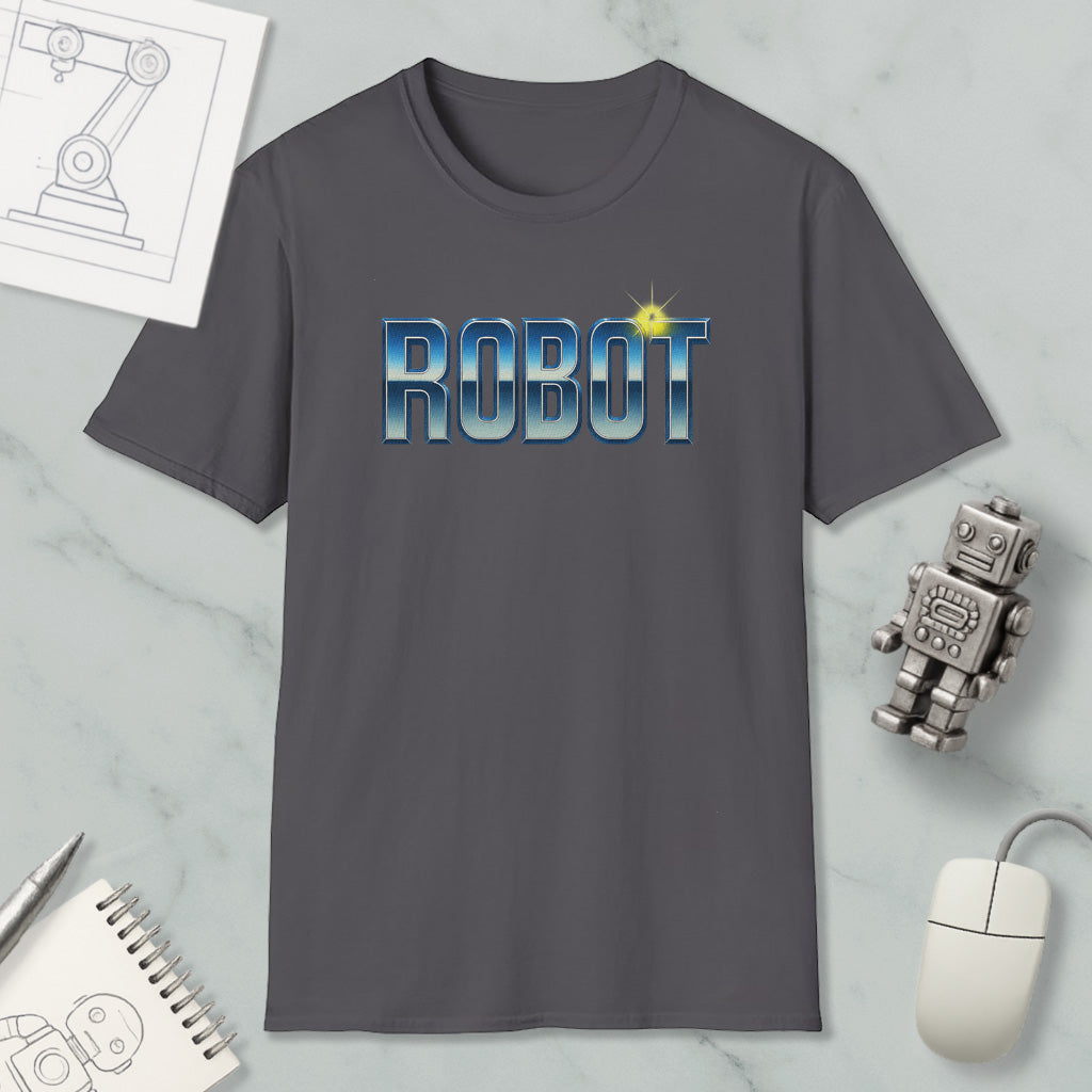 a gray t-shirt with the word "ROBOT" printed on it, along with a small robot figurine and some other items such as a notebook and a mouse.