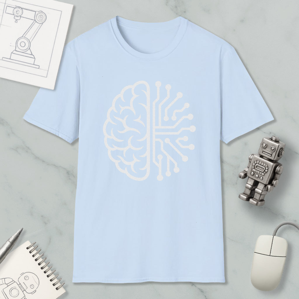 a light blue t-shirt with a white brain design, a computer mouse, a robot, and a notebook on a marble surface.