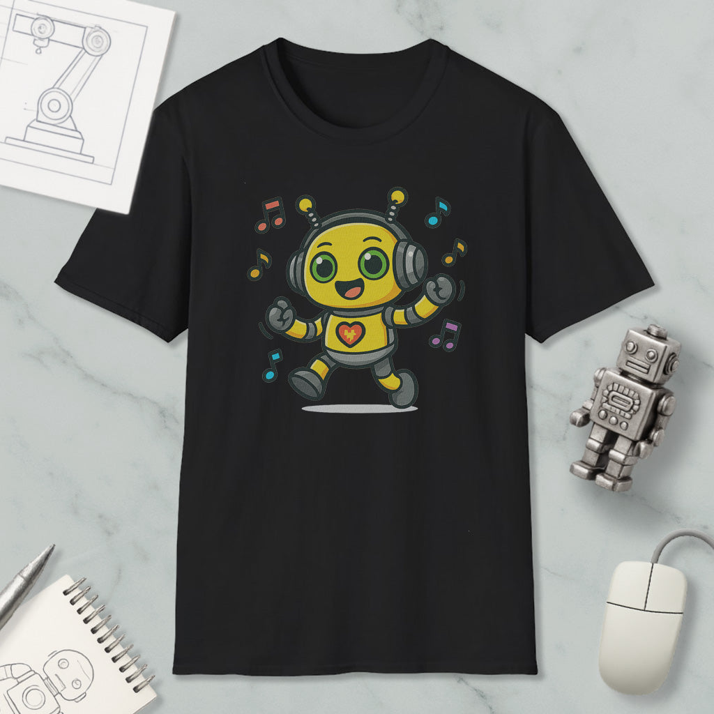 a black t-shirt with a cartoon robot design, surrounded by various objects such as a mouse, a notebook, and a robot figurine.