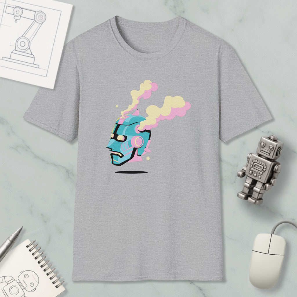 a gray t-shirt with a colorful graphic design, a small robot, a computer mouse, and a notebook on a marble surface.