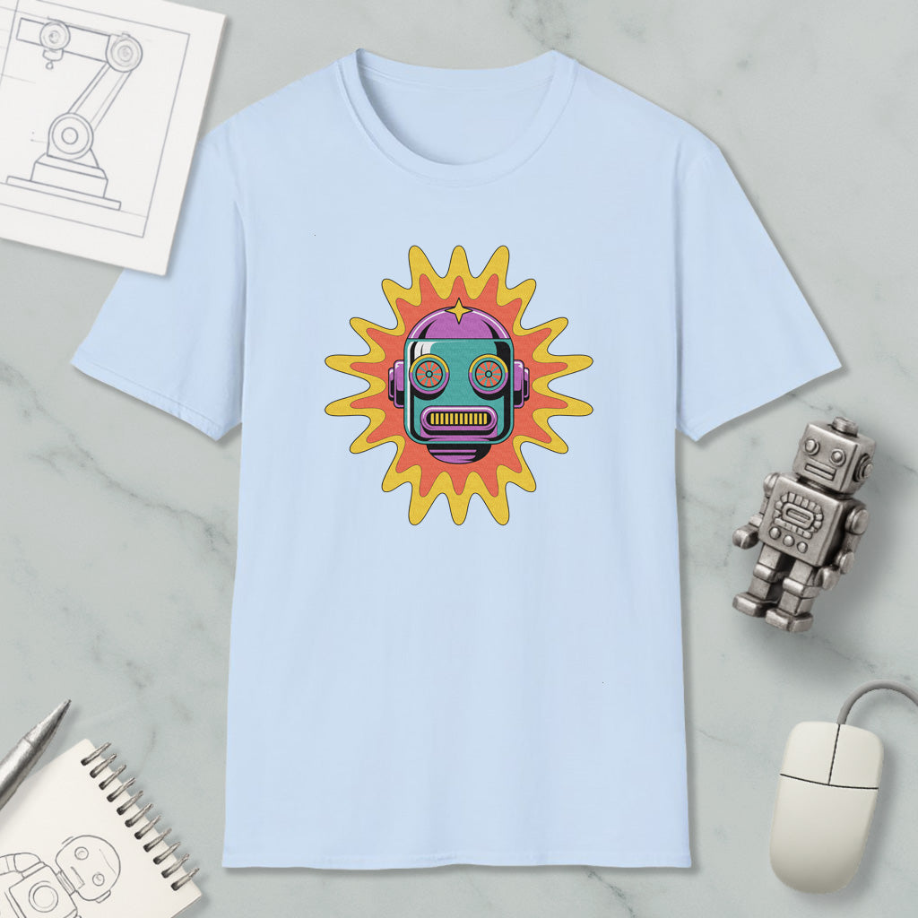 a light blue t-shirt with a colorful robot design on it, along with various objects such as a computer mouse, a notebook, and a sketch of a robot.