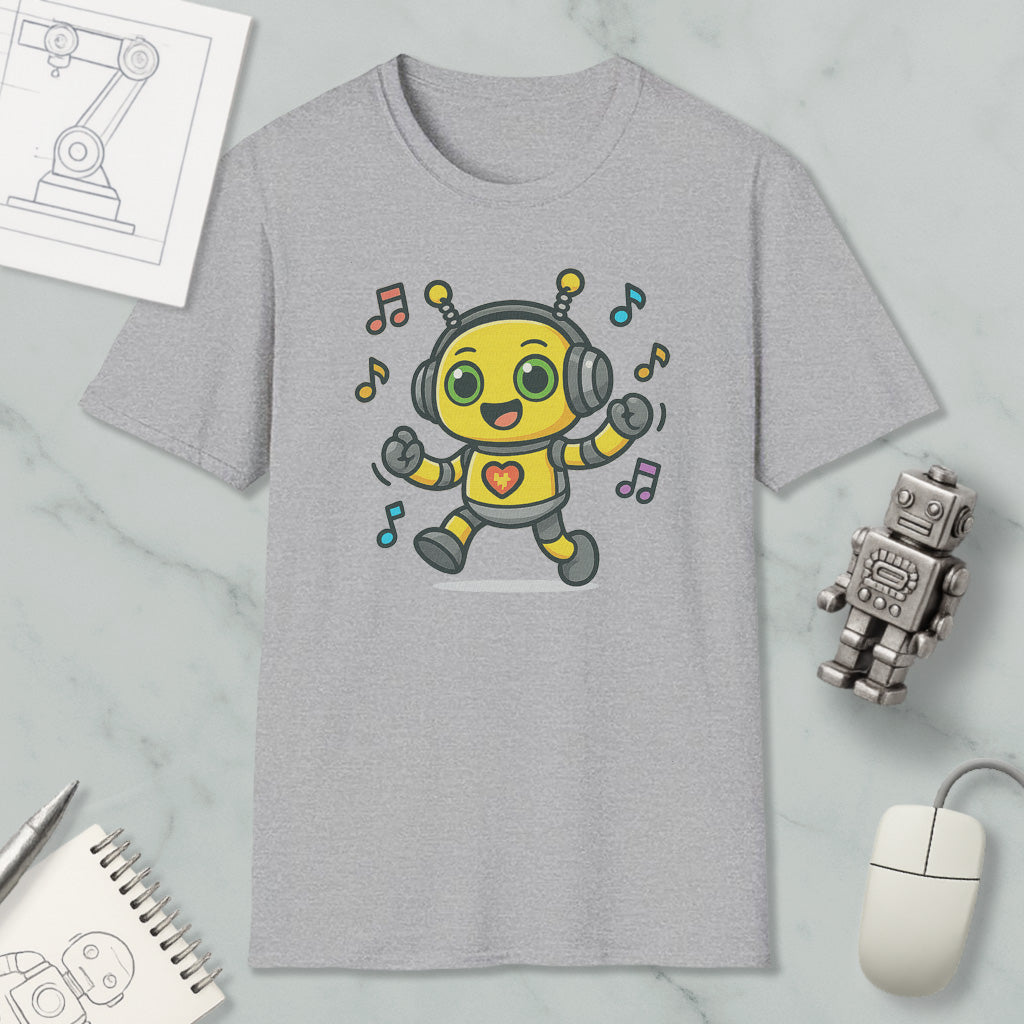 a gray t-shirt with a cartoon robot wearing headphones and dancing, surrounded by musical notes. The t-shirt is placed on a marble surface, with a computer mouse, a pen, and a notebook nearby.