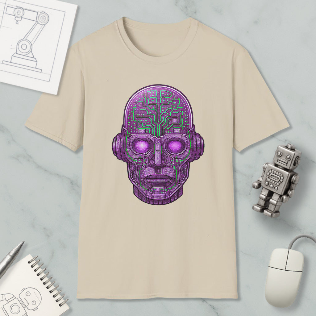 a beige t-shirt with a purple robot or cyborg head design, along with various objects such as a computer mouse, a notebook, and a pen.
