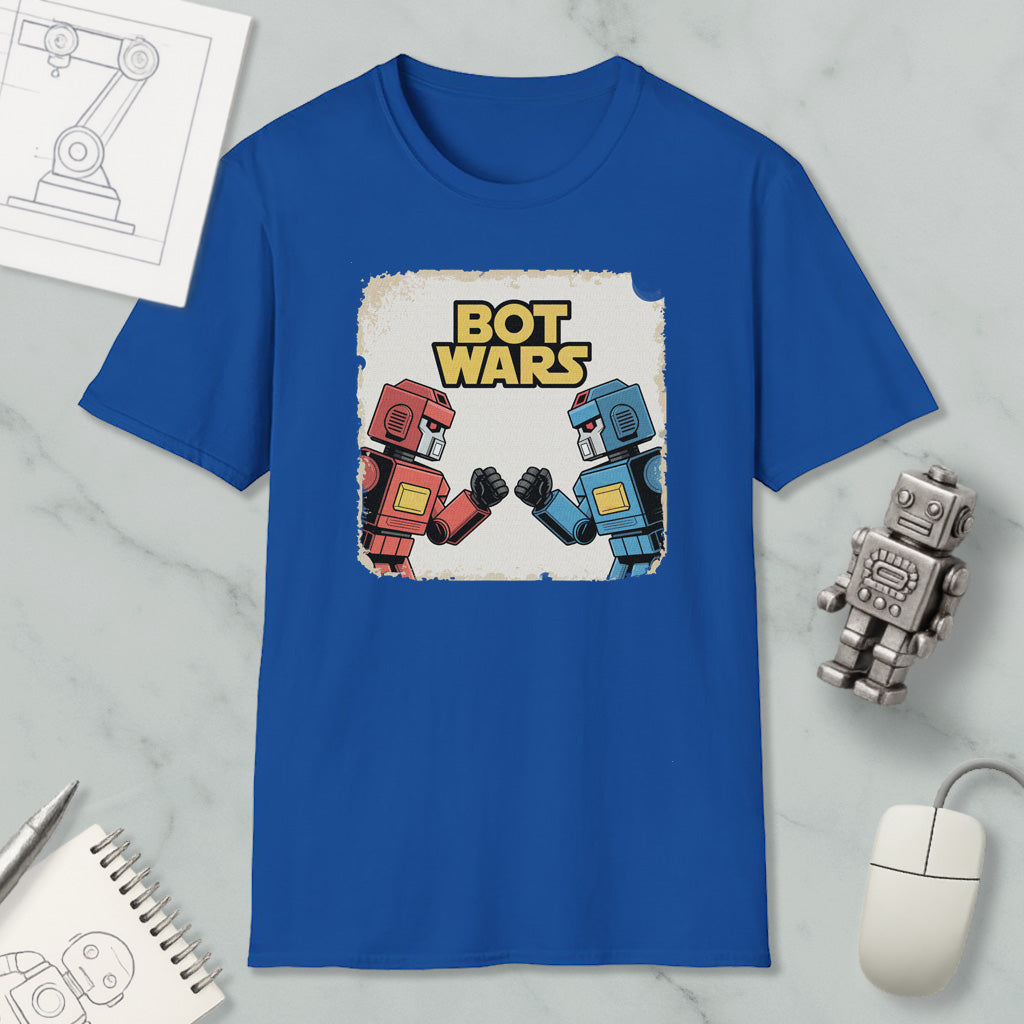a blue t-shirt with a graphic design of two robot characters, one in red and the other in blue, engaged in a battle or fight. The text "BOT WARS" is displayed above the characters, suggesting a theme related to robotic or artificial intelligence.