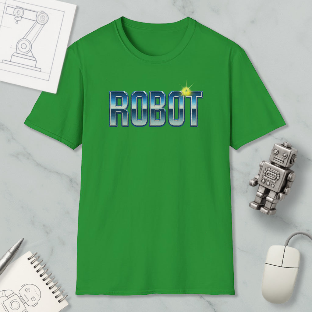 a green t-shirt with the word "ROBOT" printed on it, along with a small robot figurine and some other items such as a notebook and a computer mouse.