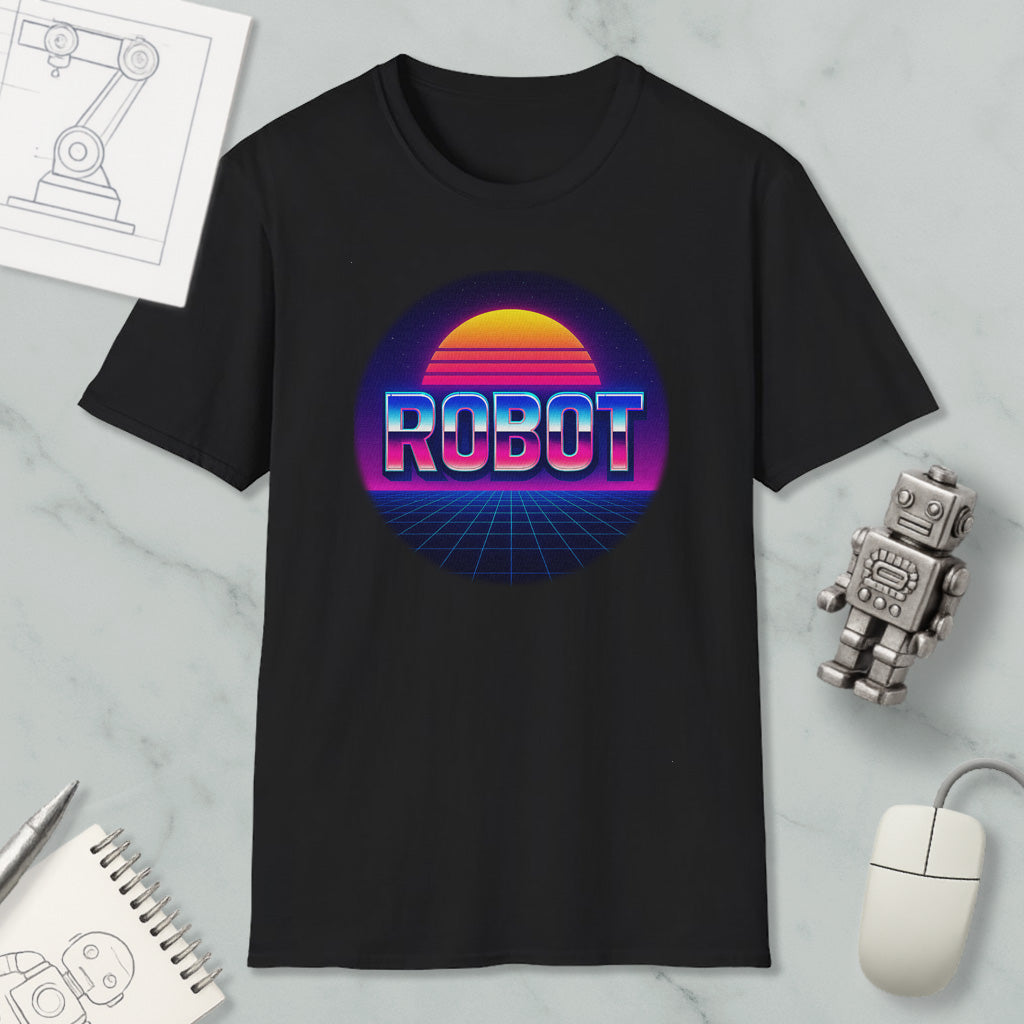 a black t-shirt with a graphic design of a robot and a sunset, along with a computer mouse and a notebook.
