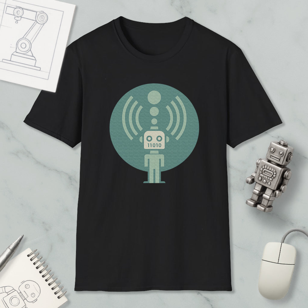a black t-shirt with a graphic design of a robot, along with various objects such as a mouse, a notebook, and a pen.