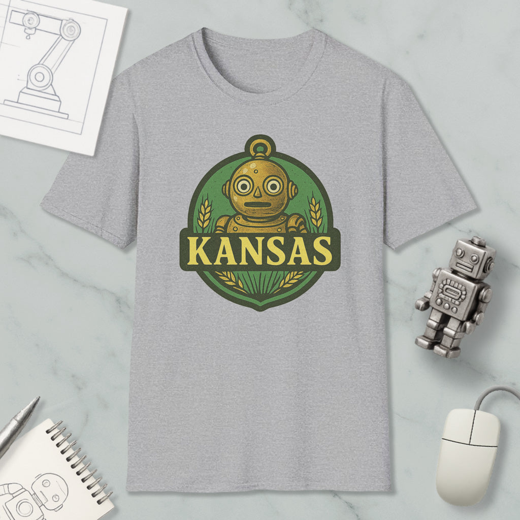 a gray t-shirt with a graphic design of a robot and the word "KANSAS" printed on it, along with a small robot and a computer mouse.
