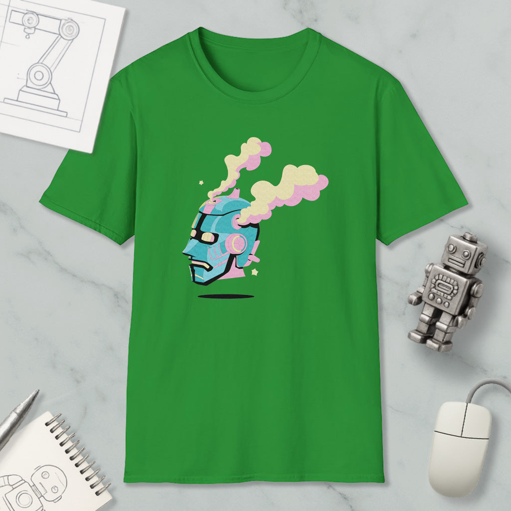 a green t-shirt with a colorful graphic design, a computer mouse, a notebook, and a small robot figurine on a marble surface.