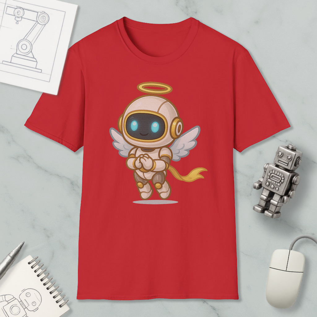 a red t-shirt with a cartoon image of a winged robot or angel, along with a computer mouse, a notebook, and a small robot figurine.