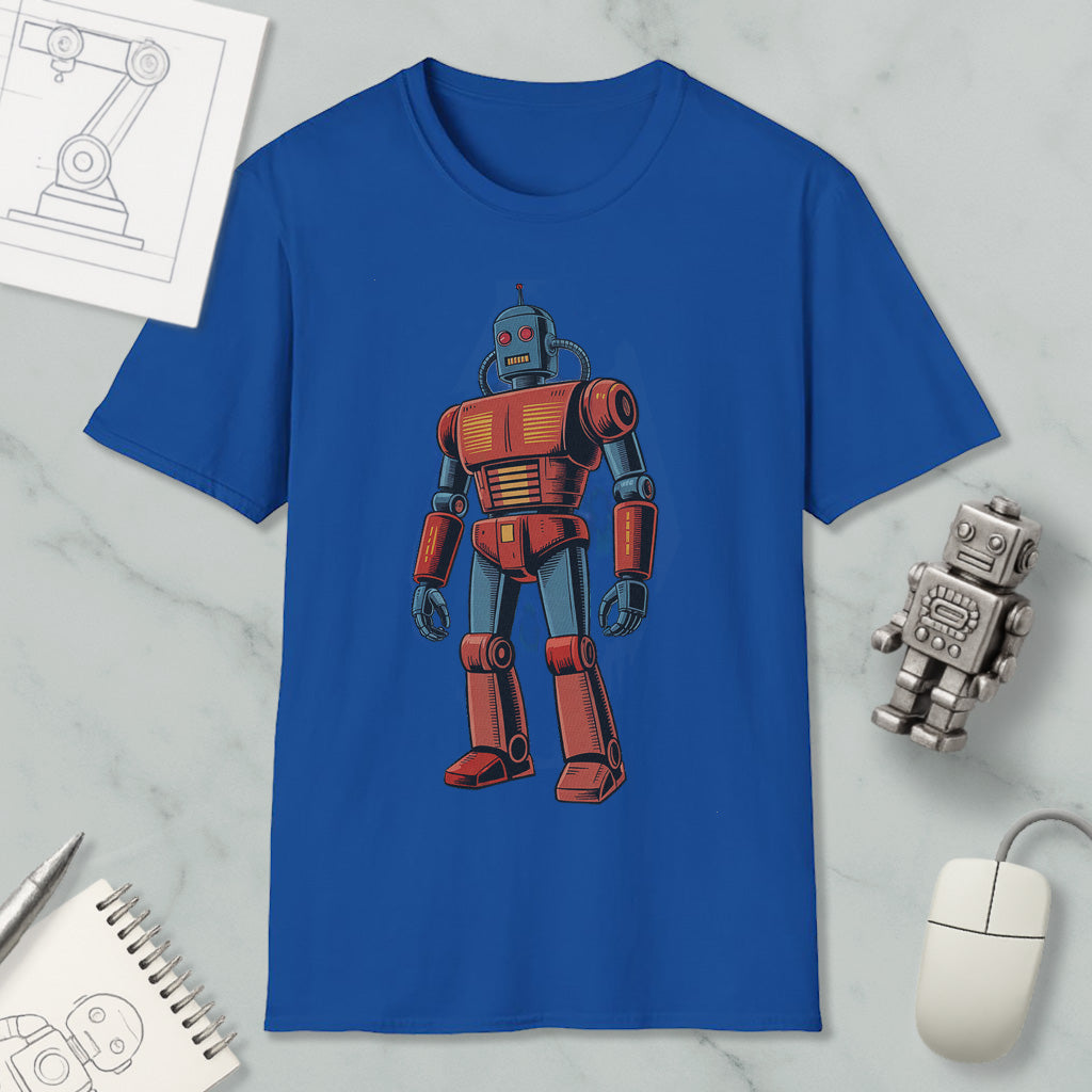 a blue t-shirt with a robot graphic printed on it, along with various objects such as a computer mouse, a notebook, and a pen.