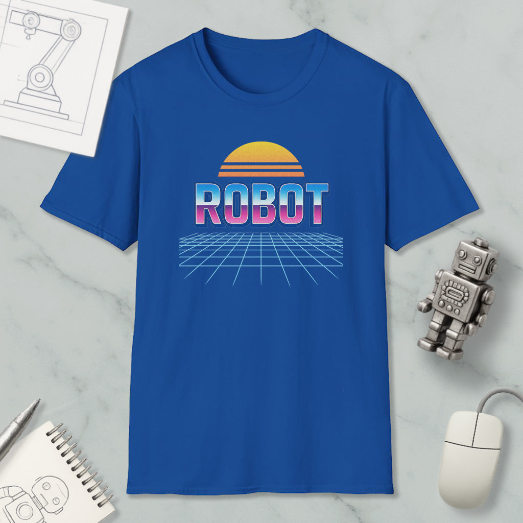 a blue t-shirt with a graphic design of a robot and a sun, along with a computer mouse and a notebook.